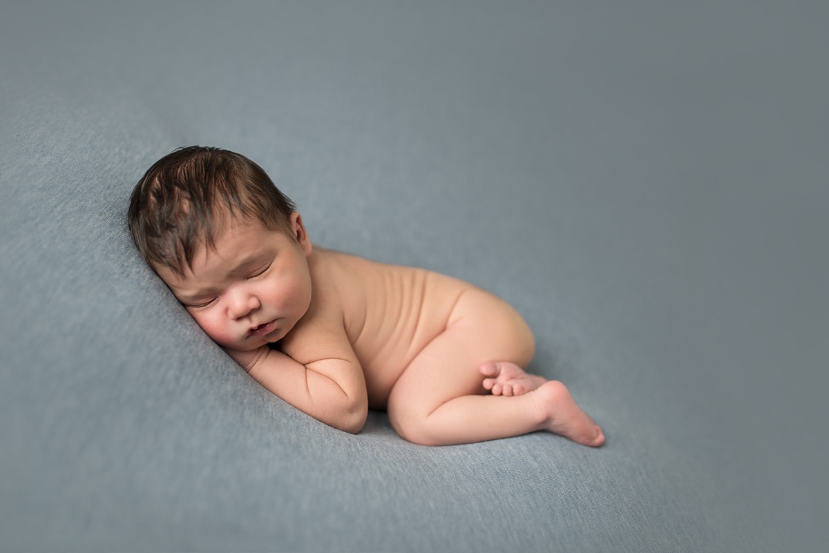 Newborn Baby Boy Photos | Red Deer Photographers | Neutral colours | blue backdrop for beanbag